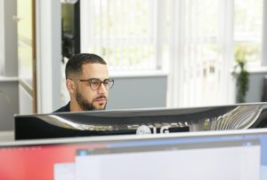 a man sitting at a desk